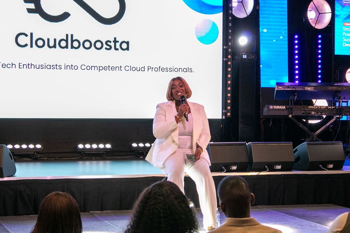 Gbemisola Ojo speaking on stage at Cloud DevOps Connect, London, 2024