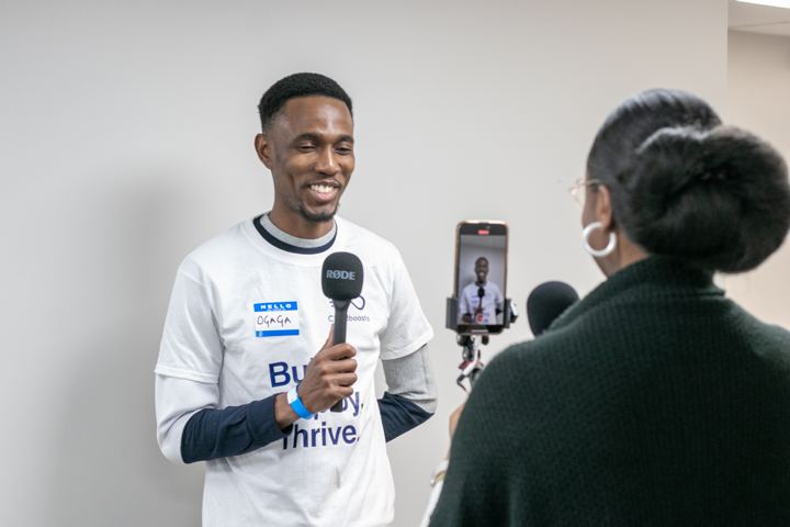 An attendee being interviewed on camera
